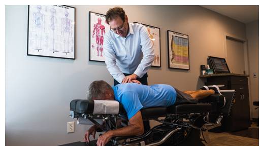 Chiropractor La Porte IN Matthew Kirkham Adjusting Patient