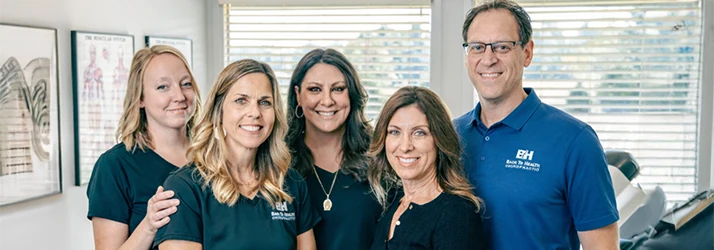 Matthew Kirkham and His Team Pose in Front of the Window For Conditions Page